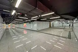 Exits B and D linking passageway