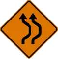 CW24-1a (D) Double reverse curve (right) (2 lanes)