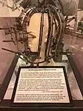 An antiquated facial proportion-measuring contraption on display.