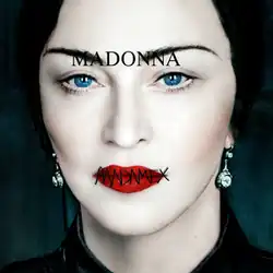 A dark-haired Madonna looking directly into the camera, with the Madame X logo printed on top of her lips.