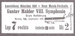 A rectangular card, the main text of which reads "Ausstellung München 1910. Neue Musik-Festhalle. Gustav Mahler VIII. Symphonie, Erste Aufführung, Montag 12. September 1910."