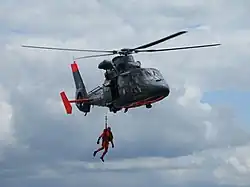 Offshore rescue by French Navy Dauphin helicopter