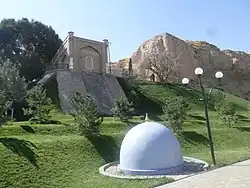 View of the mausoleum and the real place (dome) of the origin of the sacred spring