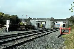 McGrath's Bridge, Drogheda McGrath's Bridge, Under the lefthand arch is the Dublin to Belfast mainline, the centre arch leads to the carriage wash shed, on the right, leads to the DMU Servicing depot.