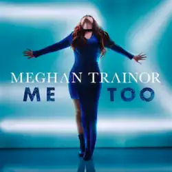 A red-haired woman stands in front of a bright blue background, wearing a navy blue dress. She looks up and spreads her arms out. Both the artist's and song's names are superimposed on the cover.