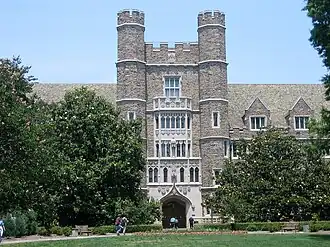 Gothic-style four-story exterior of a building with castle-like turrets