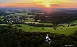 Mount Michelsberg, St Michael's pilgrimage chapel with a view towards Mahlberg at sunset, 2024