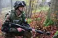 Image 2A soldier from Moldova pulls security while conducting a company situational training exercise during exercise Combined Resolve III at the Joint Multinational Readiness Center in Hohenfels, Germany, Oct. 26, 2014