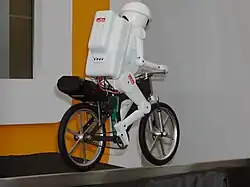 Murata Boy, a 50 cm (20") high bicycle-riding robot developed by the company since 1991