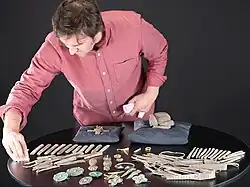 Martin Goldberg, senior curator at National Museums Scotland, examining the hoard