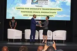 Mr Peat receives honour from the Ministry of Foreign Affaors and Foreign Trade