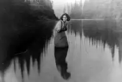 A scene from The Grub-Stake in which Nell Shipman is in a lake.