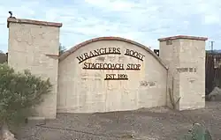 Front gate of the historic Wranglers Roost Stagecoach Stop