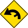 Curve between 90 and 120 degrees with minor road, to left