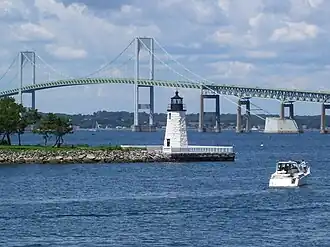 The lighthouse with the Newport Bridge in the background