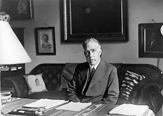 Bohr sitting at his desk