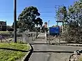The pedestrian railway crossing gates, northern side of the station, August 2024