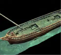 An overhead view of the forward two-thirds of a shipwreck