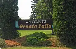 Oconto Falls greeting sign, facing WI-22 South on the northeast side of town