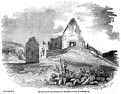 At etching showing the residence and church in the 19th century. Both buildings are in better condition than currently with the walls much more complete.