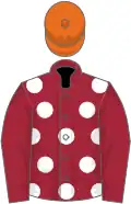 Maroon, white spots, maroon sleeves, orange cap