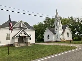 The Pierrepont Town Hall (left) and the Pierrepont Union Church make up part of the National Register-listed Pierrepont Town Buildings complex.