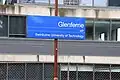 Platform signage for Glenferrie railway station, showing the information for the nearby Swinburne University of Technology campus in Hawthorn, just across from Glenferrie station, August 2024