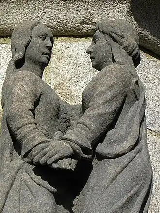 A depiction of the Visitation (Christianity) with Mary meeting Elizabeth.