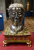 Head of pope Alexander; 1145; wood, silver, gilt bronze, gems, pearls and champlevé enamel; height: c. 45 cm; Art & History Museum (Brussels, Belgium)[139]