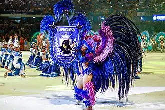 The porta-estandarte (standard-bearer) of the Boi Caprichoso