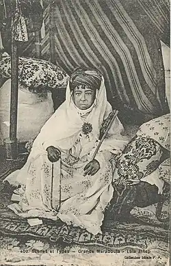 Black-and-white photograph of Lalla Zaynab in a postcard