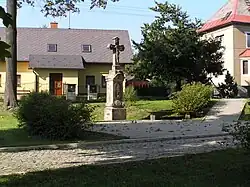 Cross next to the church