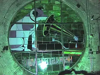 One of 4 Nipper stained glass windows seen from inside the "Nipper Tower" in the old RCA Victor Building 17[78]