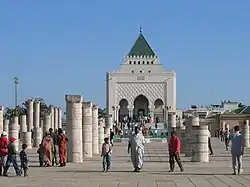 Mausoleum of Mohammed V seen through the mosque ruins