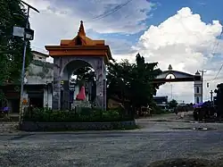 Statue and entrance gate at Ramagrama stupa, Parasi district, Nepal