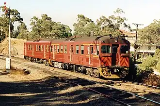 Two Red Hen railcars working a Belair–Adelaide local train during the late 1980s, approaching Lynton