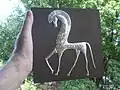 Repoussé on tin sheet – "Greek horse" by Mexican artist Manolo Vega, 2011