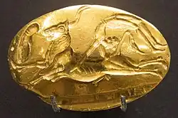 Bull-leaping on a gold signet ring