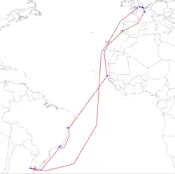 A map of the Atlantic ocean, with the Americas on the left and Eurasia on the right. A red path connects twelve numbered blue dots as described in the image caption.