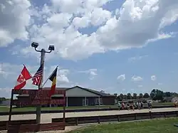 Annawan's Rolle Bolle courts in Howe's Park. A sign declares the courts as the location of the Rolle Bolle World Tournament.