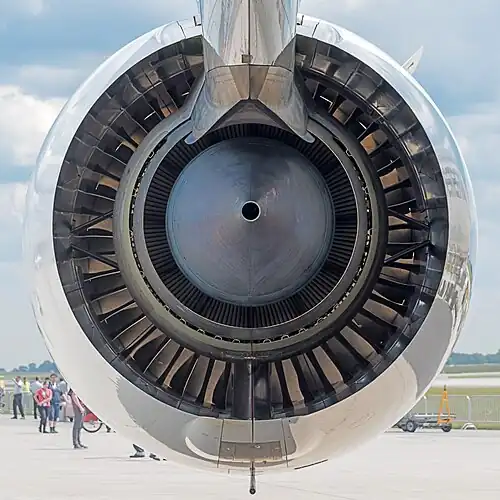 Turbofan (Trent) showing core nozzle and turbine blades, and bypass nozzle and fan bypass stators. The two nozzle wakes are made up of the waste which goes with thrust production. Both have residual velocity loss from their kinetic energy which is accounted for by pr eff. The core has heat rejected from the thermodynamic cycle and component losses. Also from the core part of the propulsion system, i.e. the nozzle and the LPT losses associated with the fan bypass flow. The fan nozzle passes the heat losses from the bypass propulsion system, i.e. the fan outer entropy generation, entropy production from the bypass duct pressure loss and the nozzle.[37]