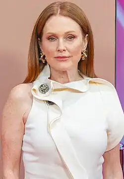 A photograph of Julianne Moore as she poses for the camera