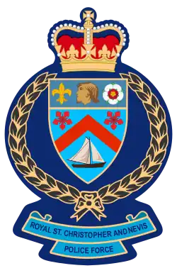 The emblem of Royal St Christopher and Nevis Police Force featuring the Crown