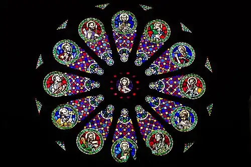Rose window representing Jesus and His disciples.