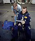 A navy blue suit being used in training by STS-68 pilot Terrence W. Wilcutt