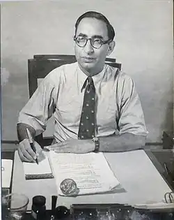 Ikram at his desk, c. 1935