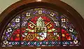 Pontifical Window with the coat of arms of Pope Benedict XV during whose reign the cathedral was dedicated