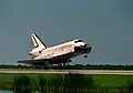 STS-105 lands at the Shuttle Landing Facility, 22 August 2001.