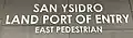 Photo of the sign on the East Pedestrian Facility at the San Ysidro Land Port of Entry.