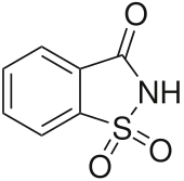 Saccharin, a cyclic sulfonamide that was one of the first artificial sweeteners discovered